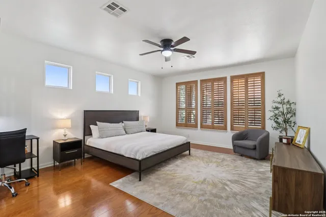 a bedroom with a bed and furniture