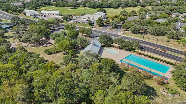 a view of a yard with a lake view