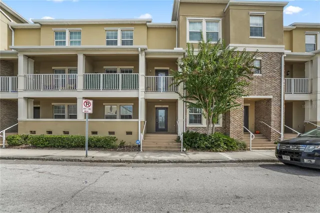 a view of a car parked in front of a building