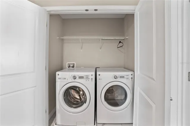a utility room with dryer and washer