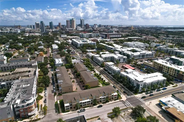 an aerial view of a city with lots of residential buildings