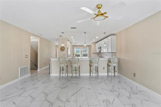 a view of a dining room with furniture