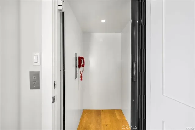 a bathroom with a sink a washer and dryer