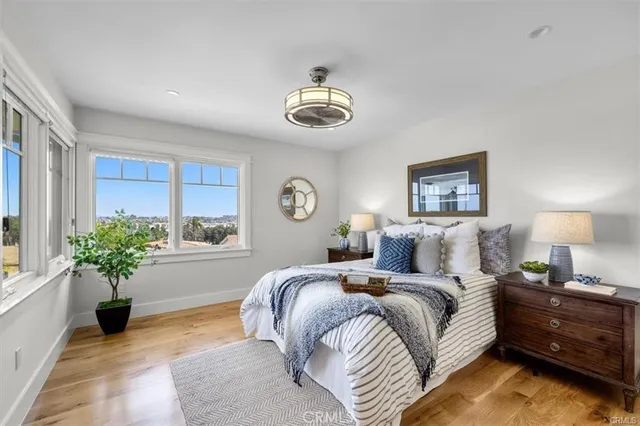 a bed room with a bed and a window