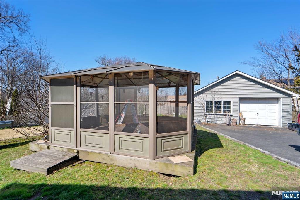 238 Springfield Avenue, Unit 1 Rutherford, NJ 07070 - Photo 22 of 33 a view of house with yard