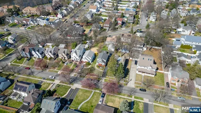 an aerial view of a city with lots of residential buildings