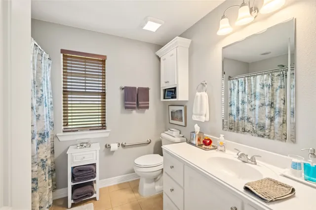 a bathroom with a sink a toilet and a bathtub