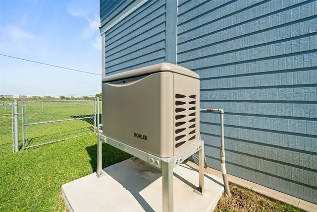 a view of a backyard with ocean view