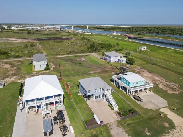 an aerial view of a house with outdoor space