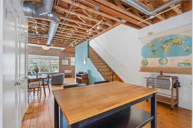 a view of entryway with wooden floor