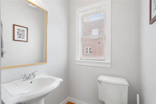 a view of a balcony with wooden floor