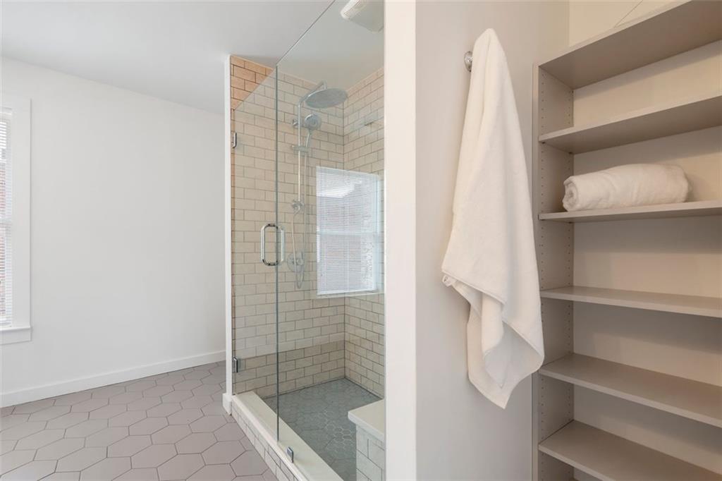 322 Peters Street Southwest, Unit 2 Atlanta, GA 30313 - Photo 29 of 58 a bathroom with a shower