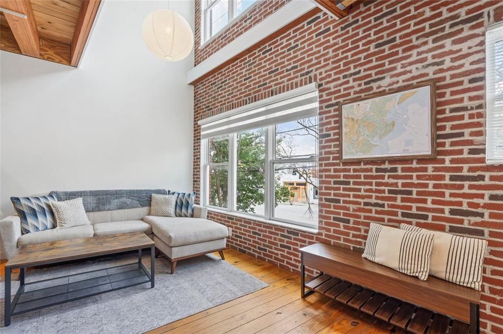 322 Peters Street Southwest, Unit 2 Atlanta, GA 30313 - Photo 3 of 58 a outdoor living space with furniture and a window