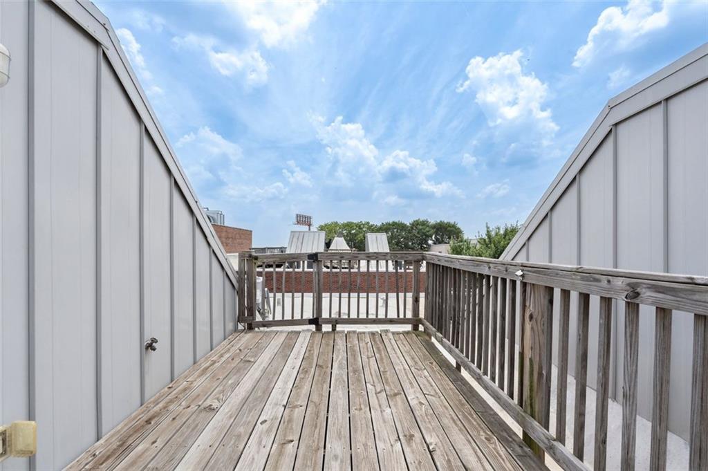 322 Peters Street Southwest, Unit 2 Atlanta, GA 30313 - Photo 33 of 58 a view of balcony with wooden floor