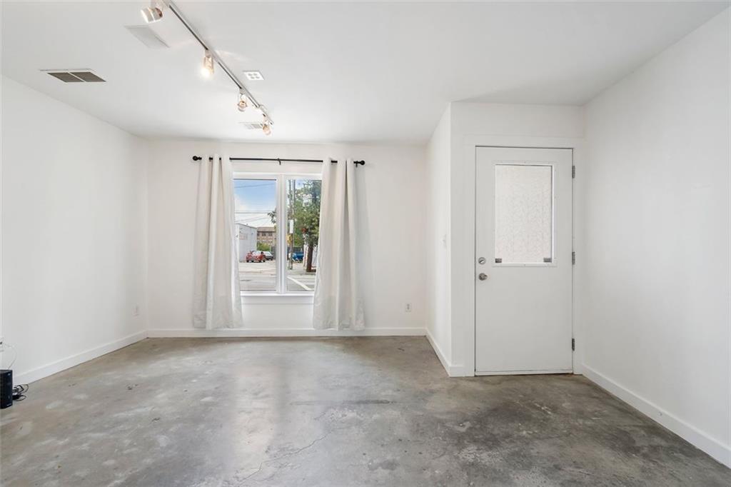 322 Peters Street Southwest, Unit 2 Atlanta, GA 30313 - Photo 37 of 58 an empty room with windows