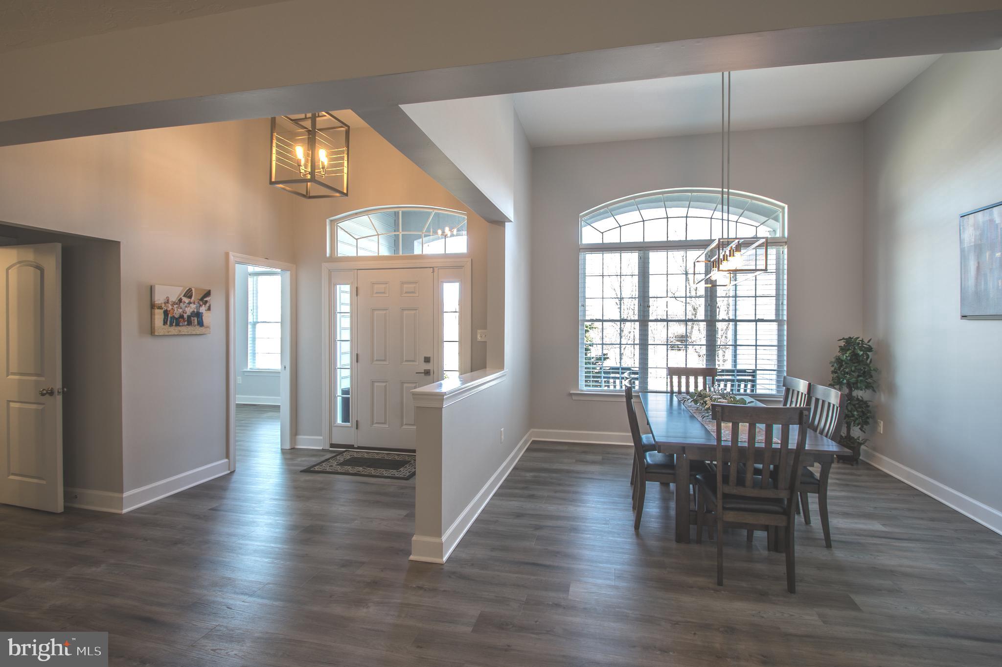 105 Quartz Ridge Road Hanover, PA 17331 - Photo 19 of 51 a view of a dining room with furniture and wooden floor