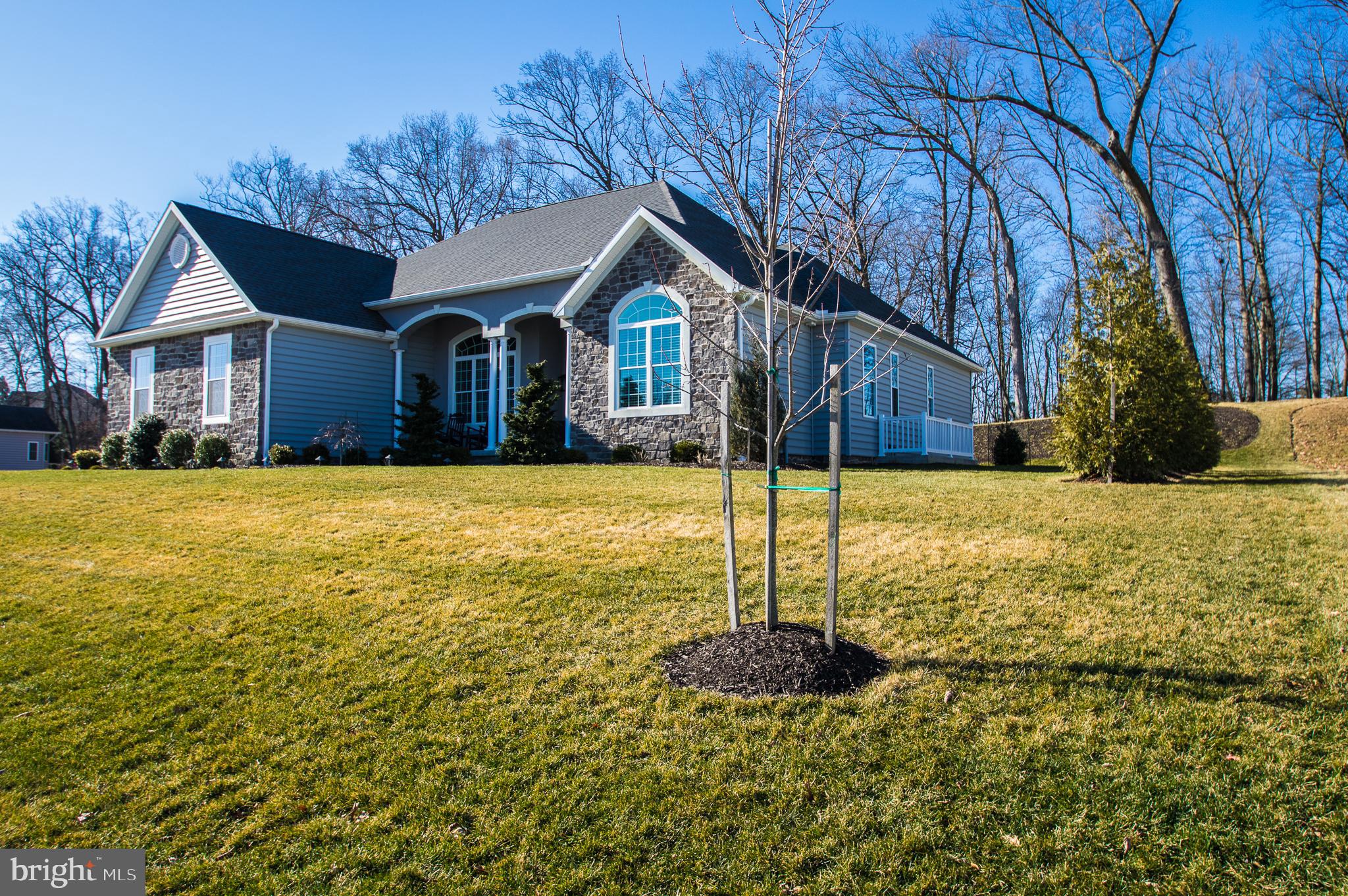 105 Quartz Ridge Road Hanover, PA 17331 - Photo 2 of 51 a front view of house with yard and trees around