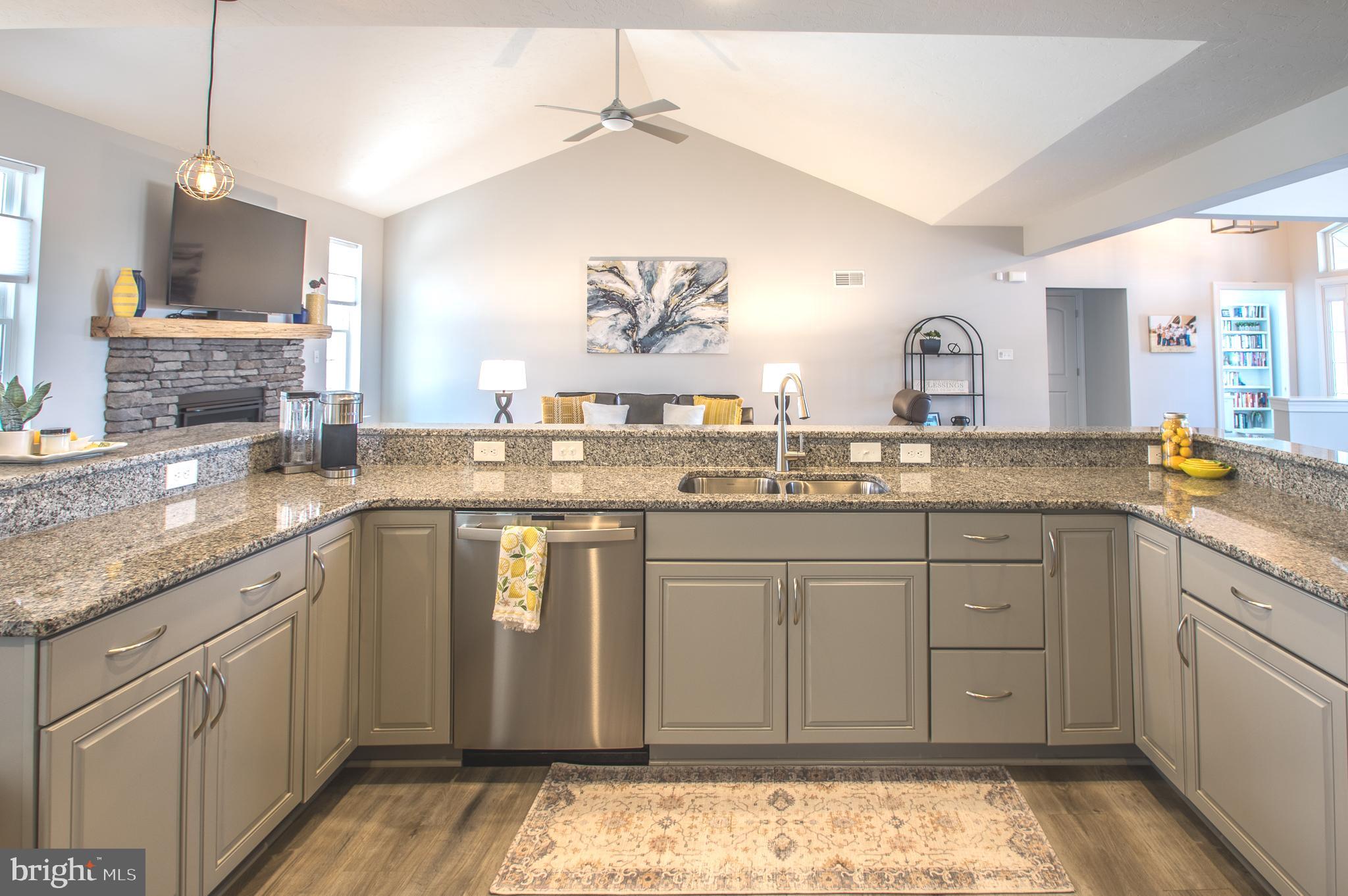 105 Quartz Ridge Road Hanover, PA 17331 - Photo 26 of 51 a kitchen with granite countertop a sink stainless steel appliances and cabinets