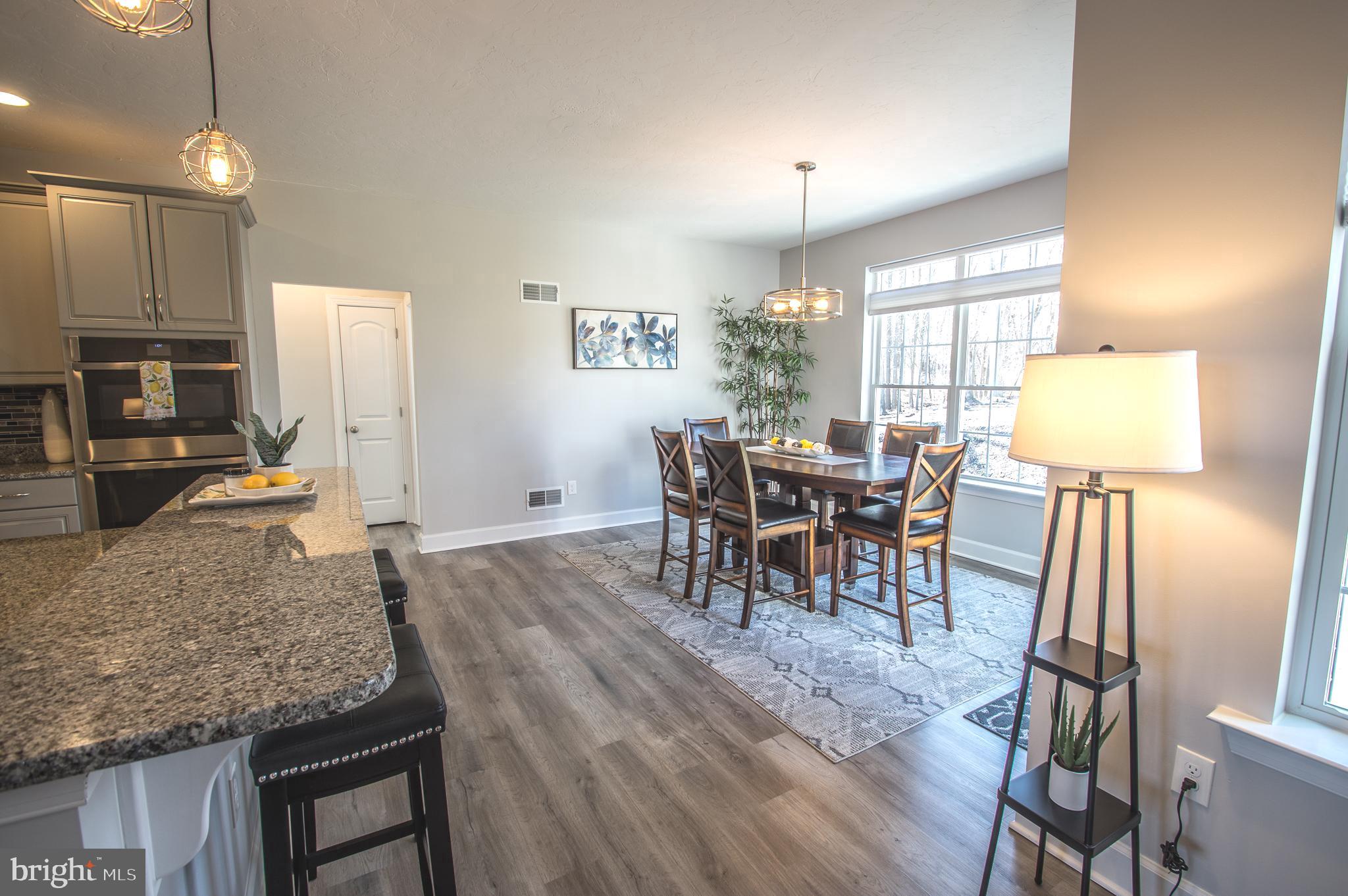 105 Quartz Ridge Road Hanover, PA 17331 - Photo 27 of 51 a kitchen with a table and chairs in it