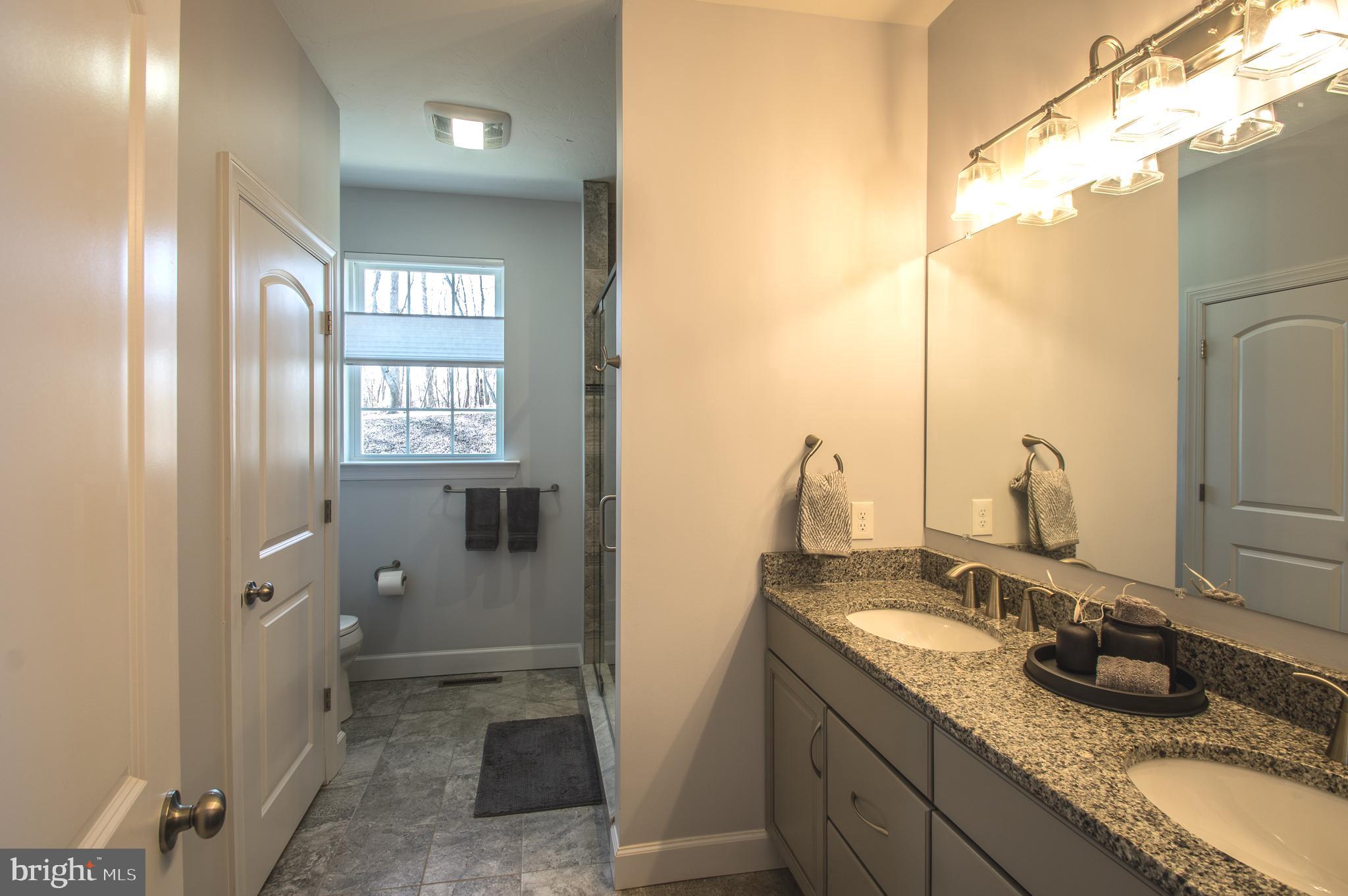 105 Quartz Ridge Road Hanover, PA 17331 - Photo 34 of 51 a bathroom with double vanity and a mirror