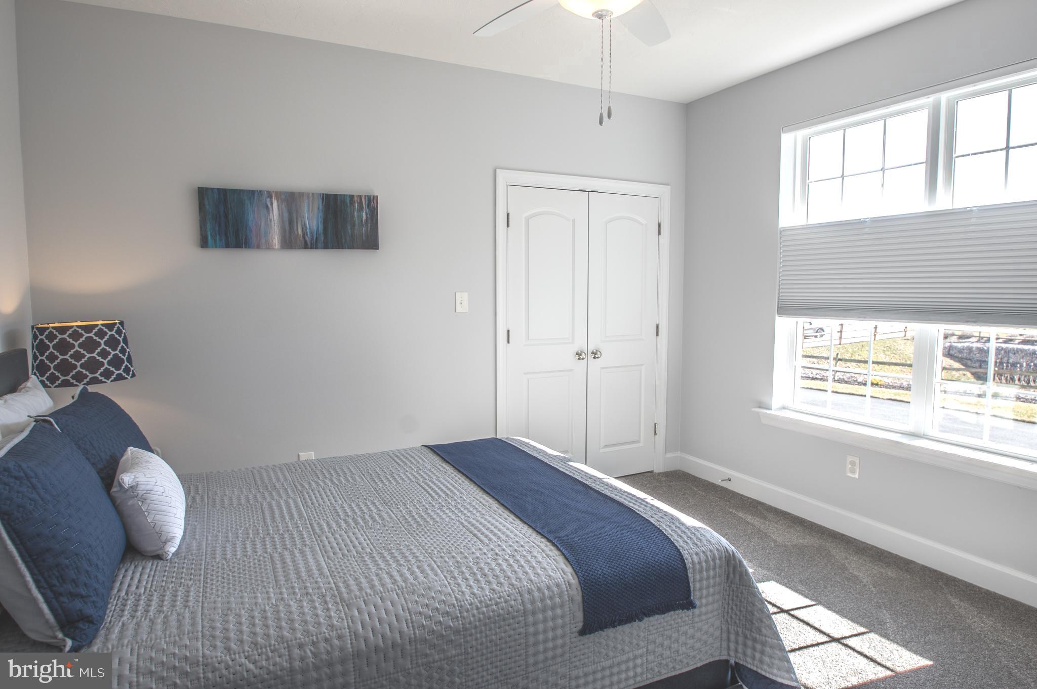 105 Quartz Ridge Road Hanover, PA 17331 - Photo 37 of 51 a bedroom with a bed and a window