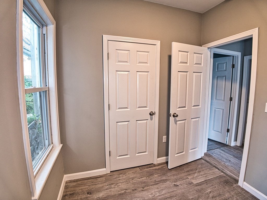 62 Bay Street Fall River, MA 02721 - Photo 12 of 21 a view of empty room with front door