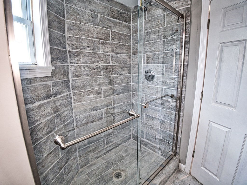 62 Bay Street Fall River, MA 02721 - Photo 17 of 21 a bathroom with a shower