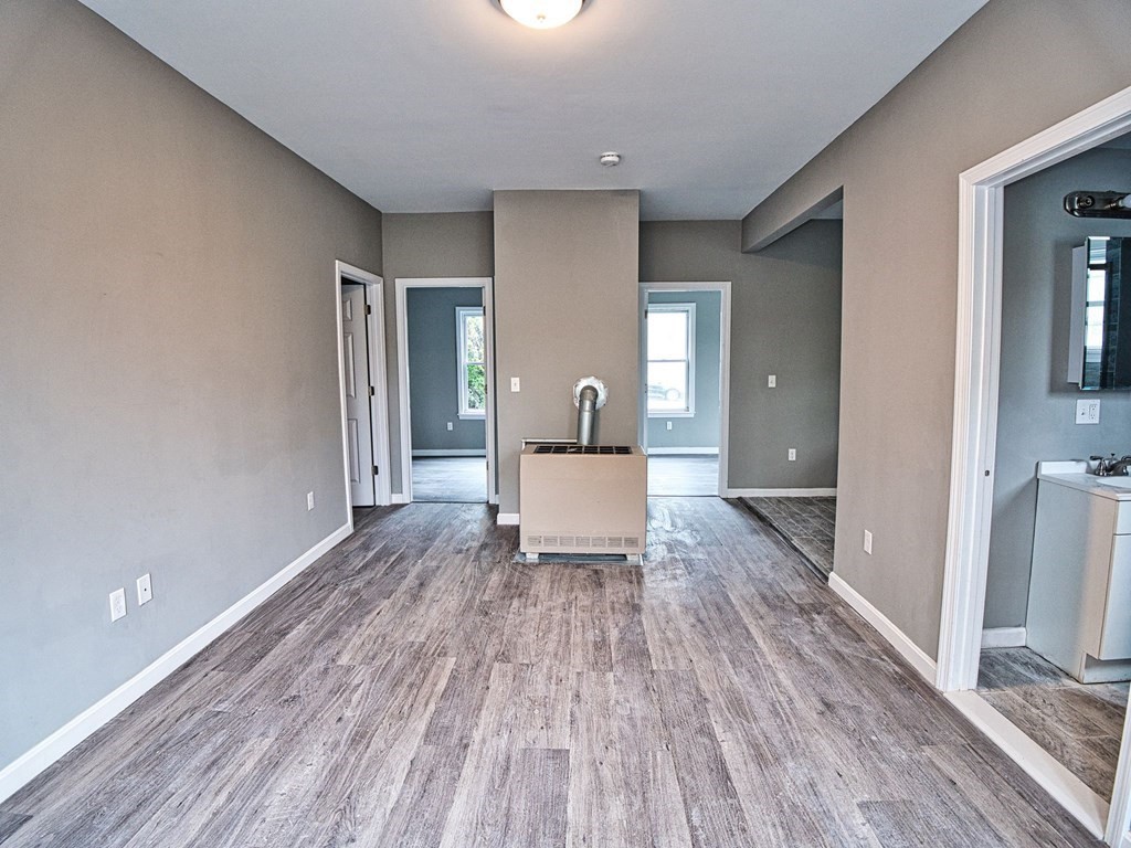62 Bay Street Fall River, MA 02721 - Photo 6 of 21 a view of a room with wooden floor and furniture