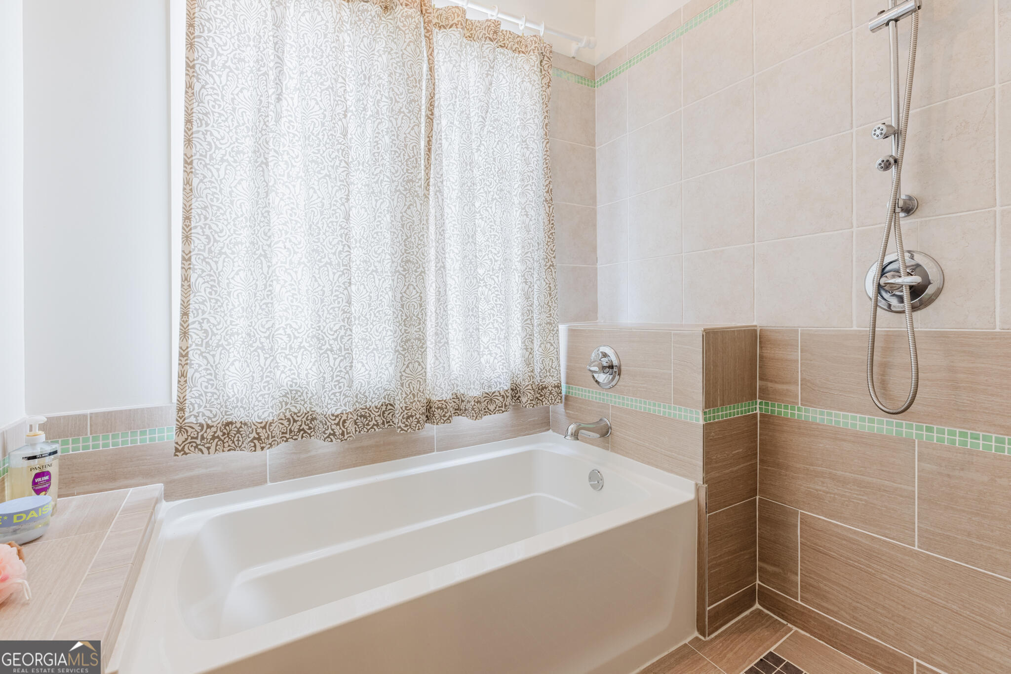 1859 Upper River Road Americus, GA 31709 - Photo 38 of 47 a bathroom with a shower and a bathtub
