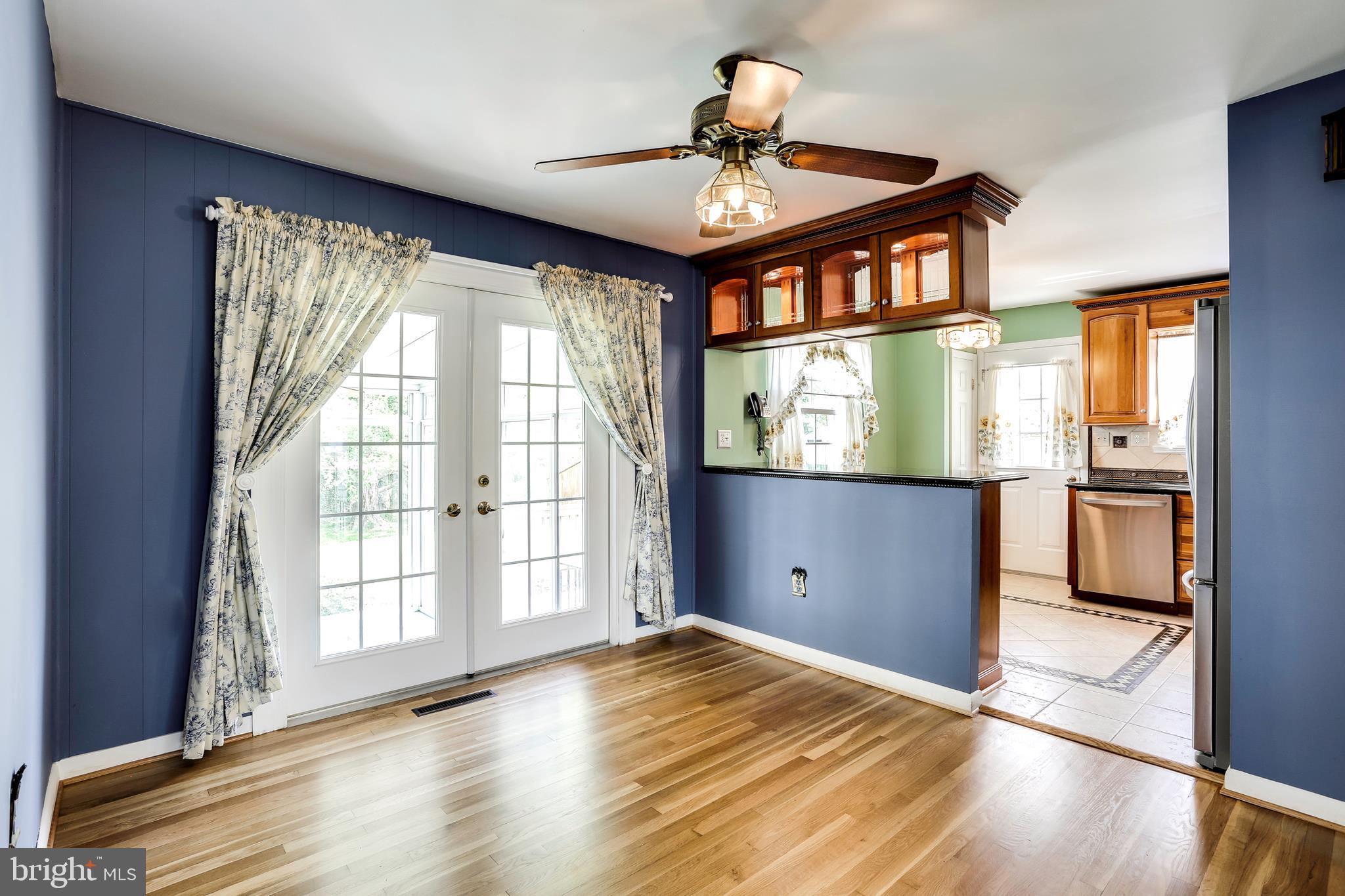 1317 Middleford Road Baltimore, MD 21228 - Photo 7 of 34 dining room that opens into the kitchen and sun ro