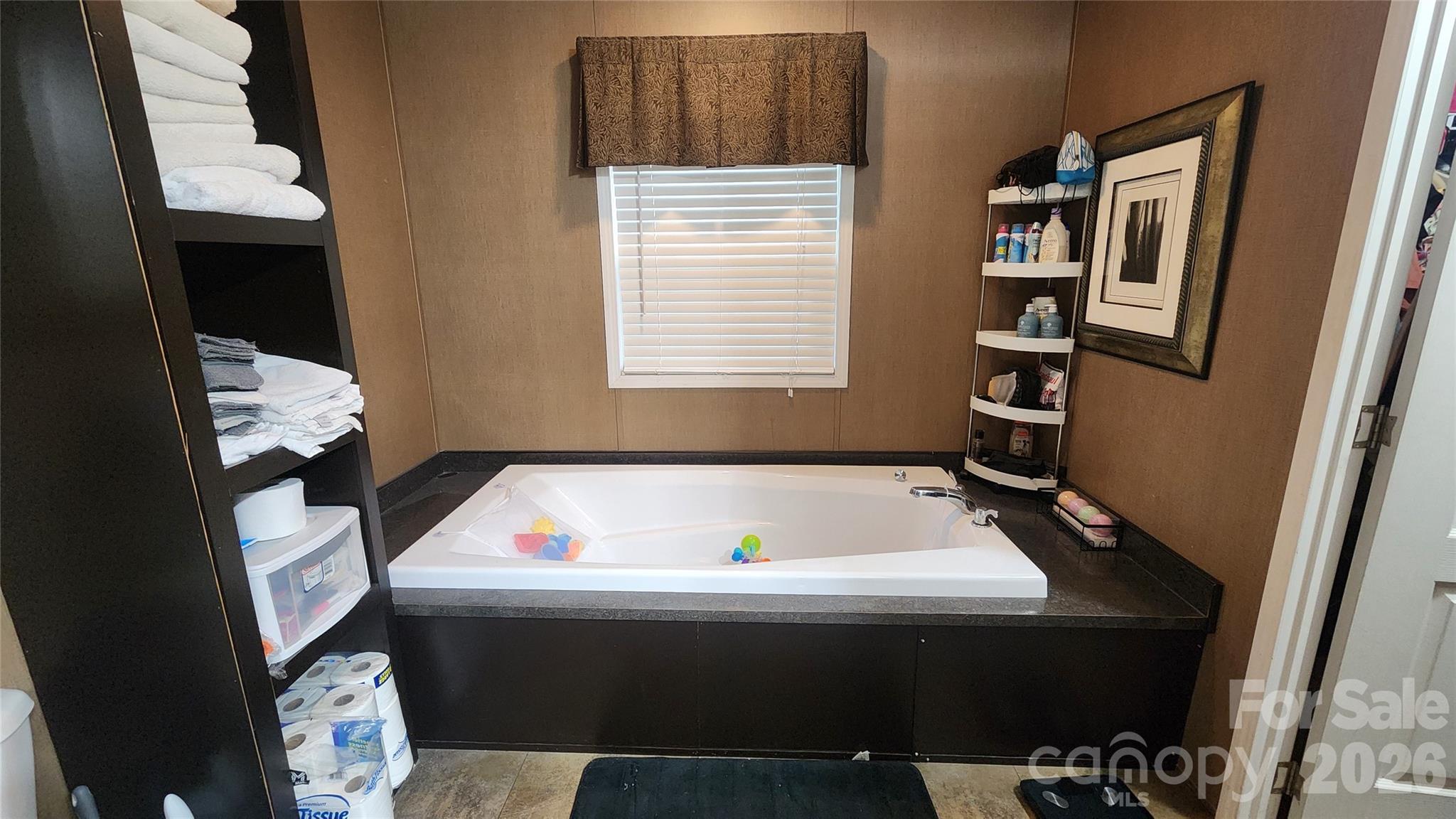 67 Indian Trail Road Candler, NC 28715 - Photo 12 of 31 a room with pool table and window