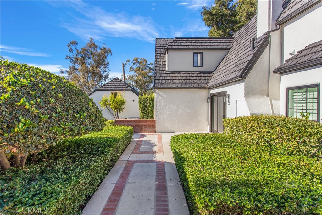 745 West Sunset Drive Redlands, CA 92373 - Photo 16 of 34 a view of a house with a garden