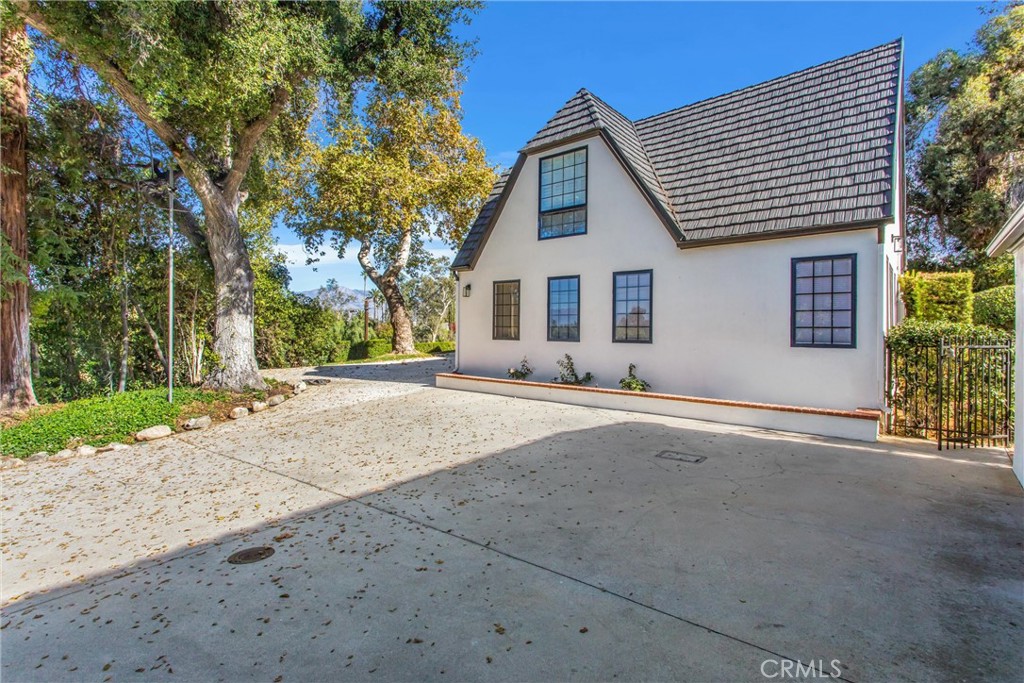 745 West Sunset Drive Redlands, CA 92373 - Photo 2 of 34 front view of a house with a street