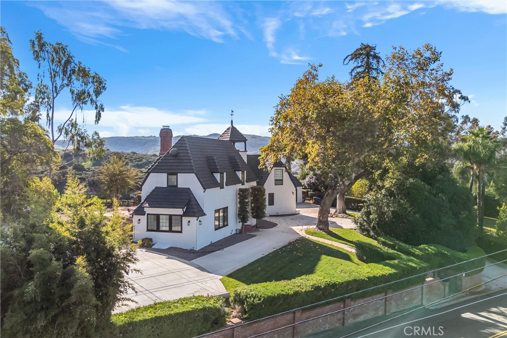 745 West Sunset Drive Redlands, CA 92373 - Photo 31 of 34 a view of a house with a yard