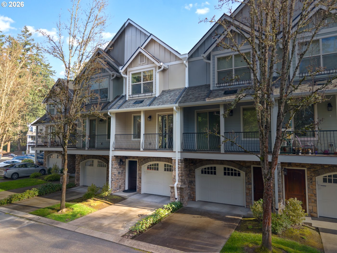 1952 Northeast 48th Way Hillsboro, OR 97124 - Photo 2 of 43 a front view of a house with a yard and garage