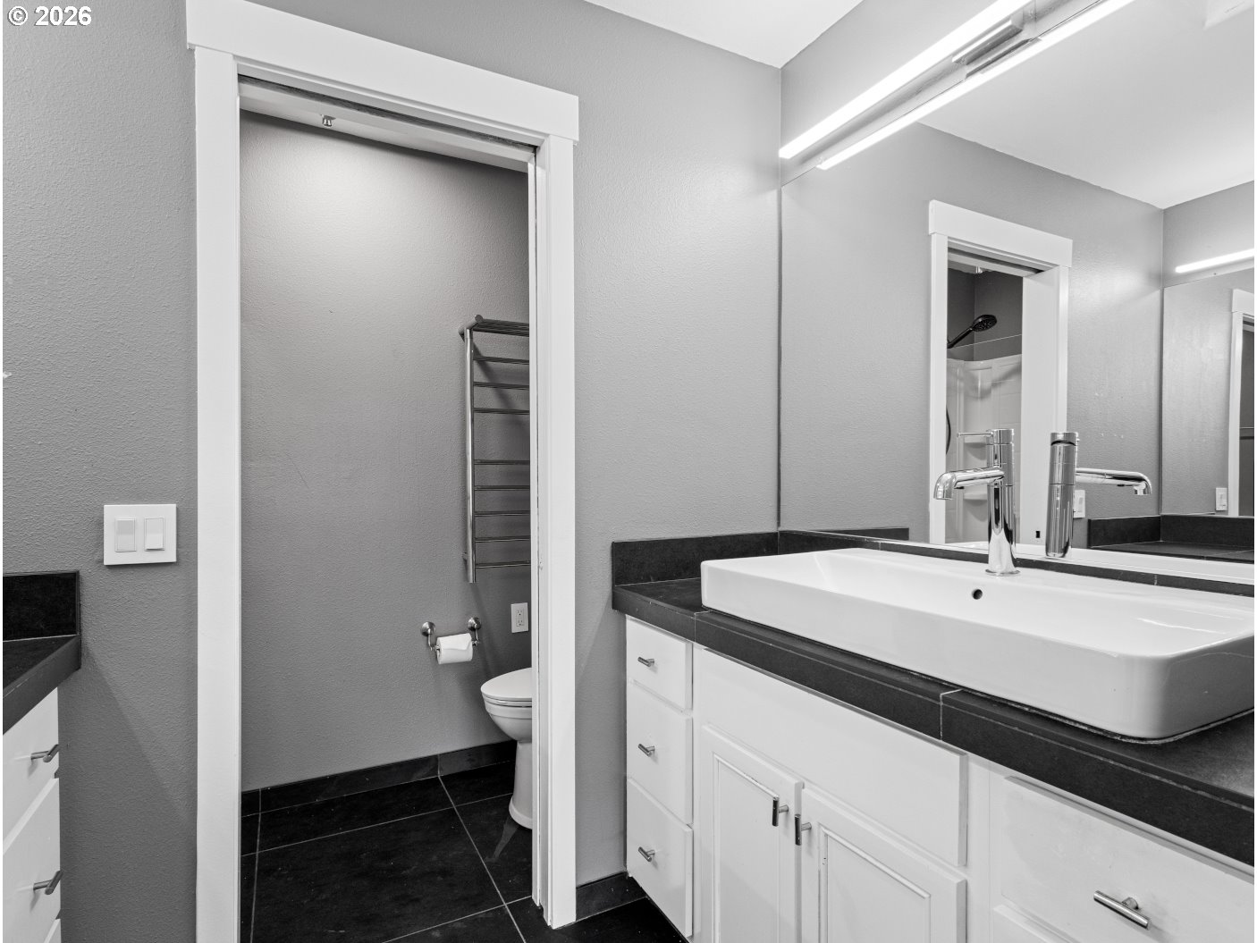 1952 Northeast 48th Way Hillsboro, OR 97124 - Photo 24 of 43 a bathroom with a sink and a mirror