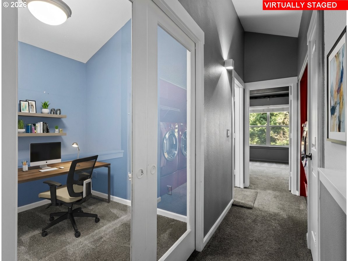 1952 Northeast 48th Way Hillsboro, OR 97124 - Photo 27 of 43 a view of a hallway with workspace and a window