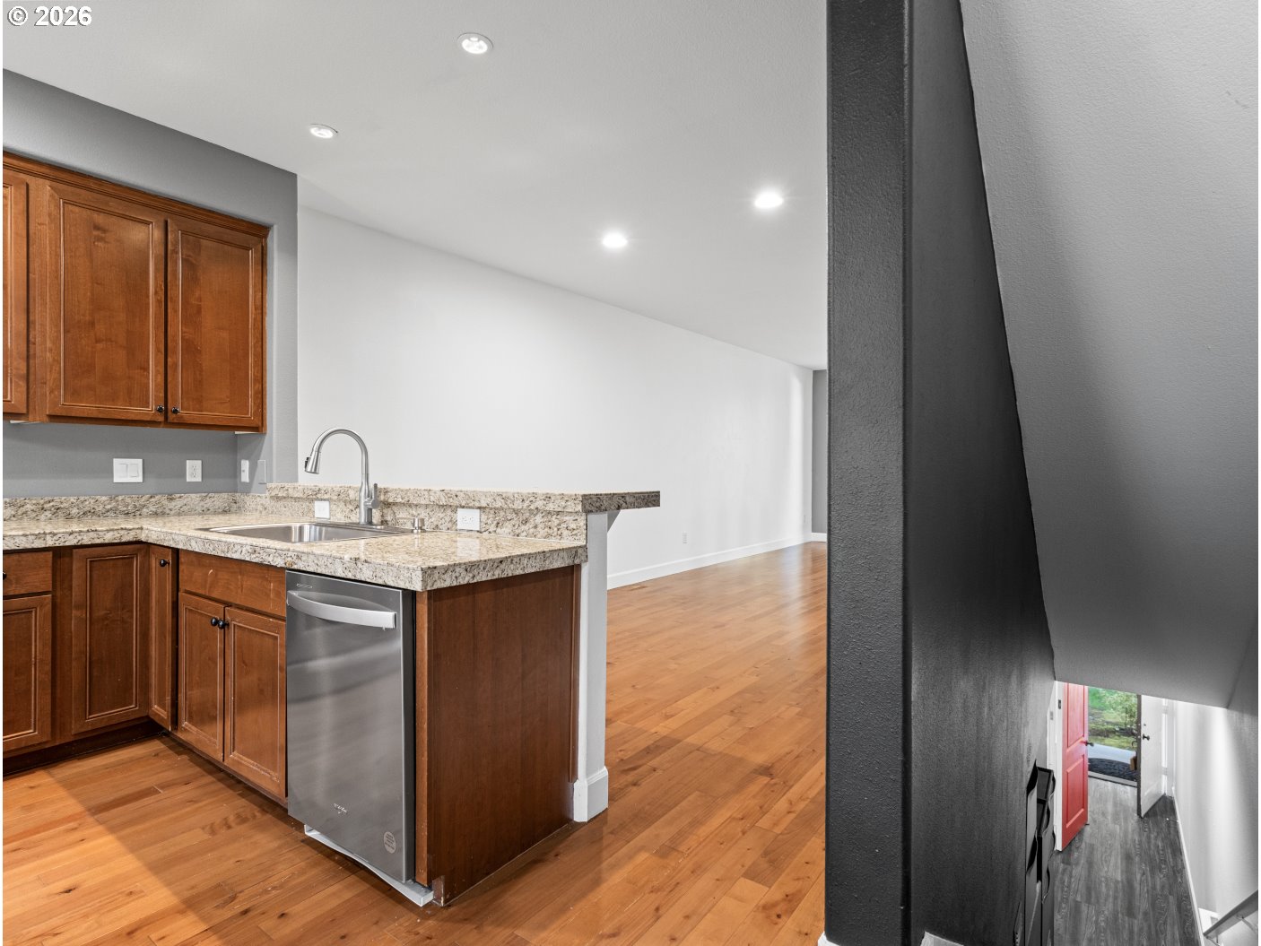 1952 Northeast 48th Way Hillsboro, OR 97124 - Photo 6 of 43 a bathroom with a sink vanity and mirror