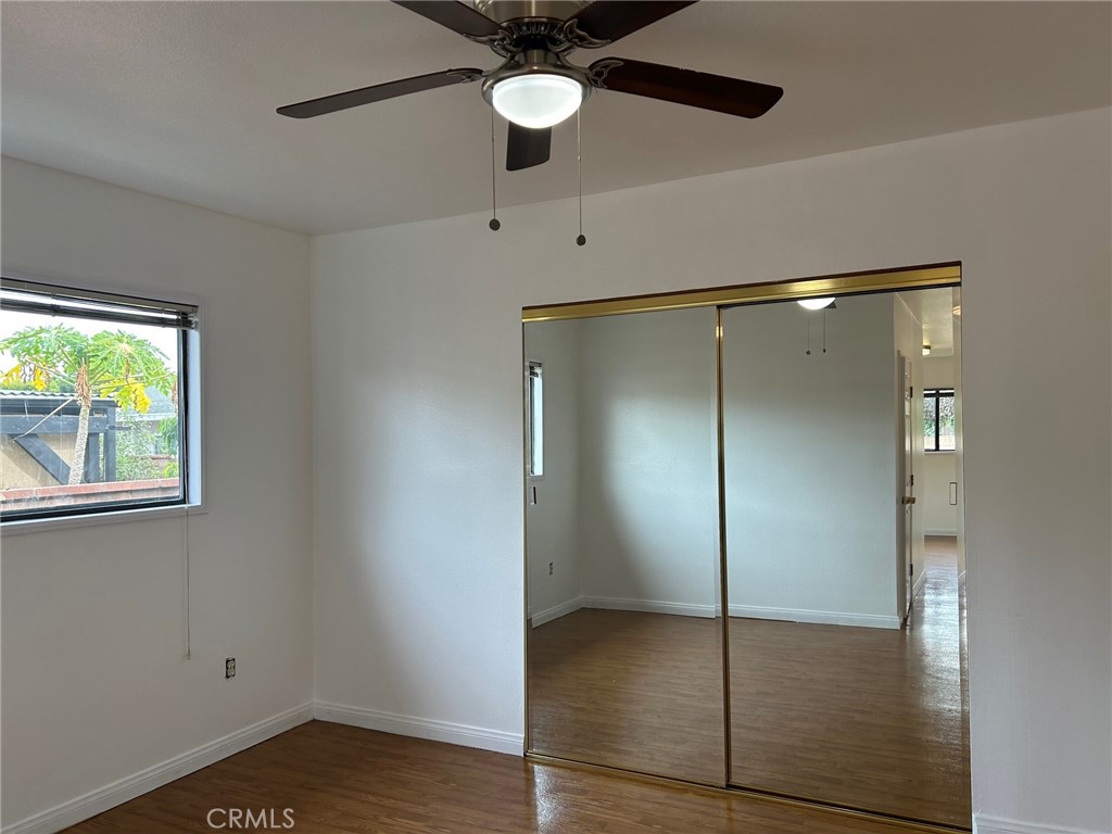 14845 Figueras Road La Mirada, CA 90638 - Photo 33 of 37 Ceiling fan with mirrored closet