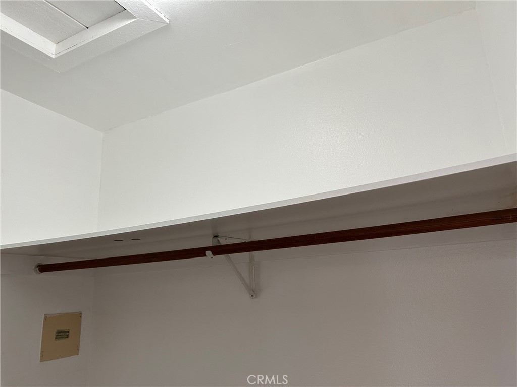 14845 Figueras Road La Mirada, CA 90638 - Photo 35 of 37 Walk in closet with light