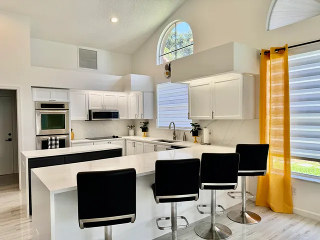 a utility room with washing machine