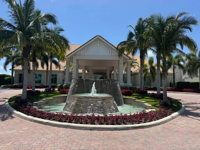 a view of house with outdoor seating