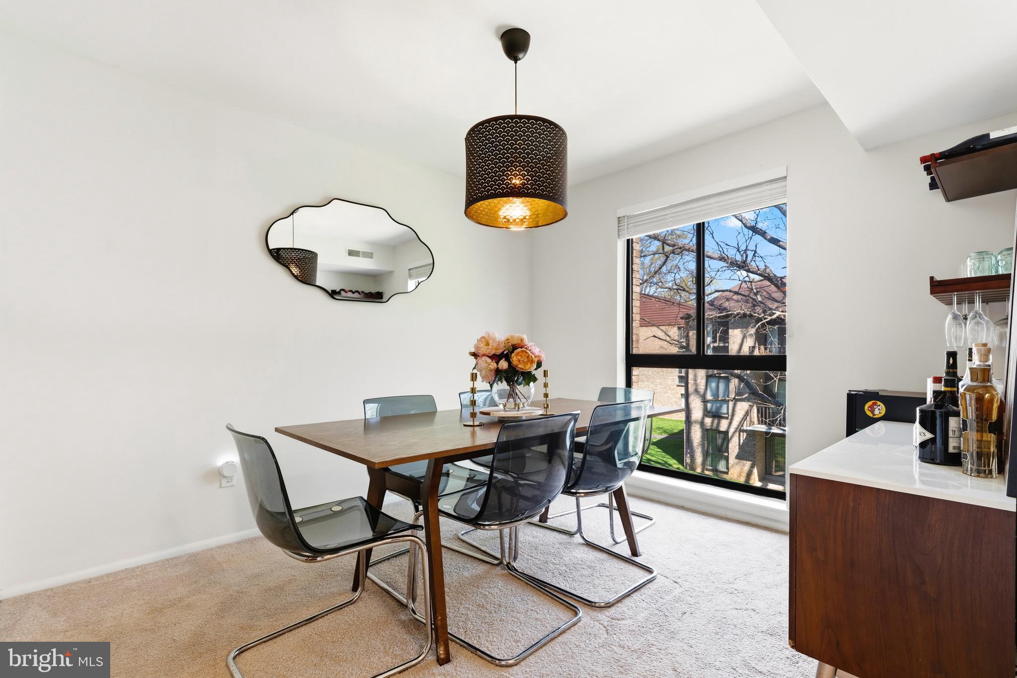 2032 Royal Fern Court, Unit 13/21A Reston, VA 20191 - Photo 11 of 28 a dining room with furniture and chandelier