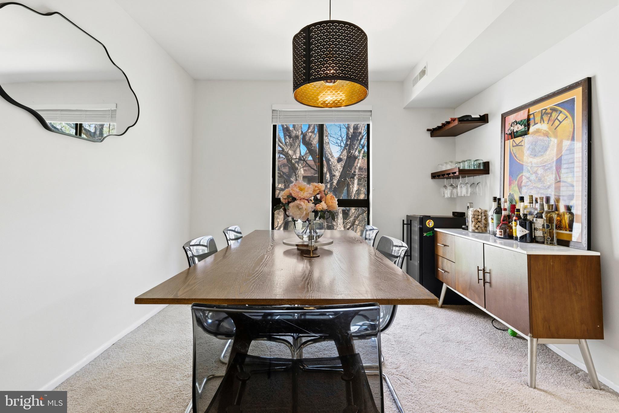 2032 Royal Fern Court, Unit 13/21A Reston, VA 20191 - Photo 13 of 28 a view of a dining room with furniture and wooden floor