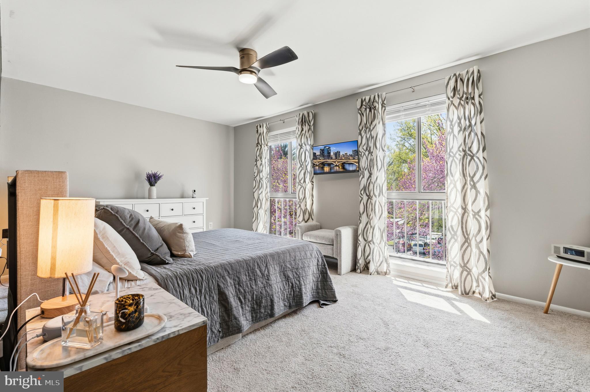 2032 Royal Fern Court, Unit 13/21A Reston, VA 20191 - Photo 20 of 28 a bedroom with furniture and a large window