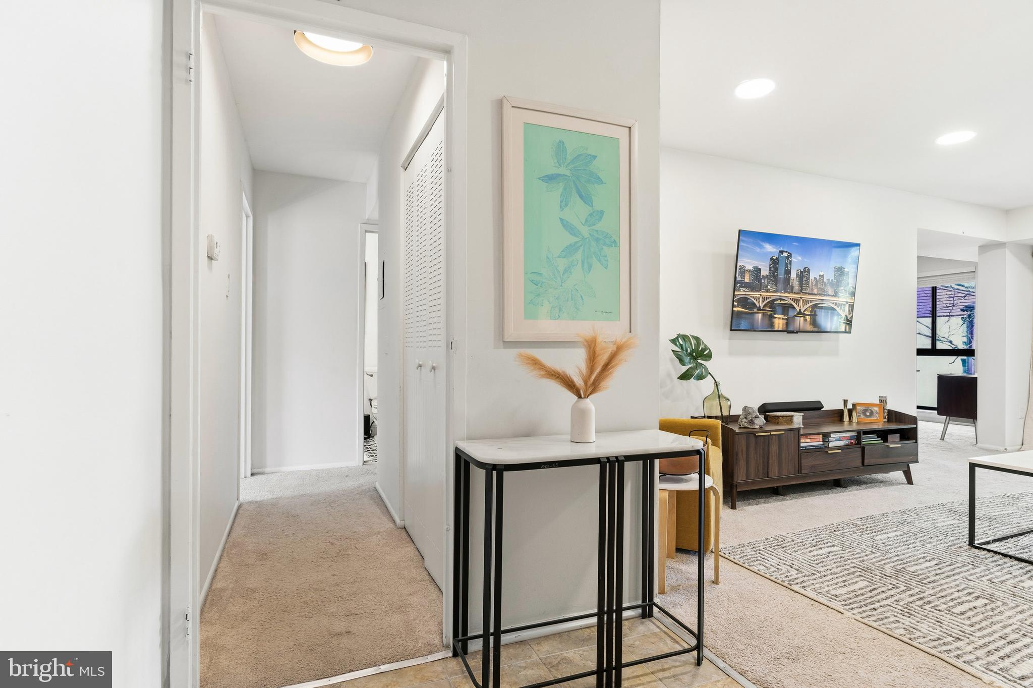 2032 Royal Fern Court, Unit 13/21A Reston, VA 20191 - Photo 3 of 28 a living room with furniture and a window