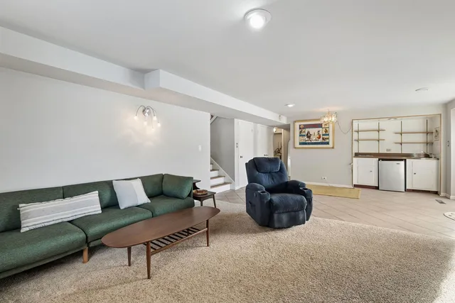 a living room with furniture and a couch