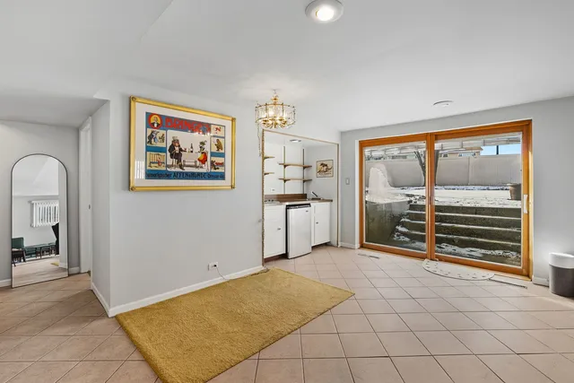 a view of a livingroom with a furniture and window
