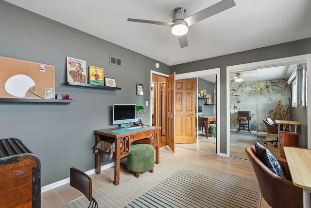 a workspace with furniture and window