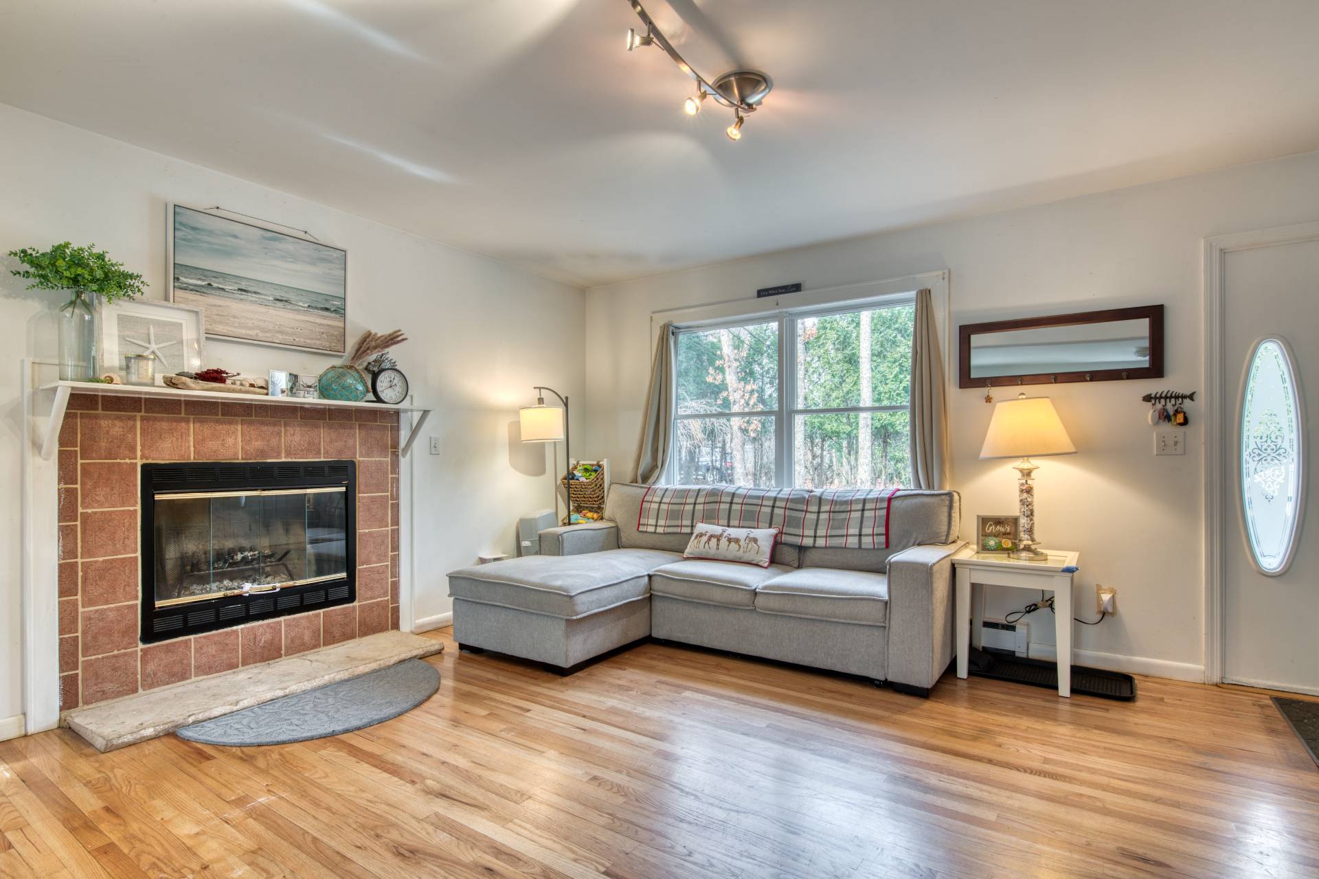 36 Barnes Avenue East Hampton, NY 11937 - Photo 3 of 13 a living room with furniture and a fireplace